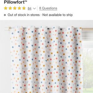 Pillowfort White Blackout Window Covering with Multicolor Dots from Target